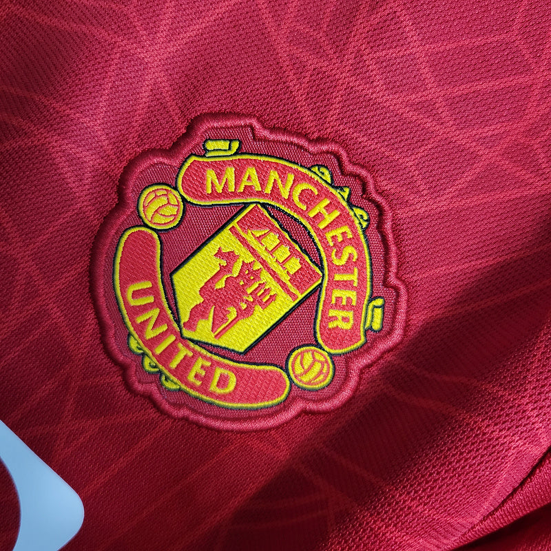 Manchester United Home 23/24 Infantil